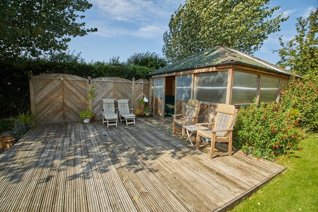 Decking and a summer house.
