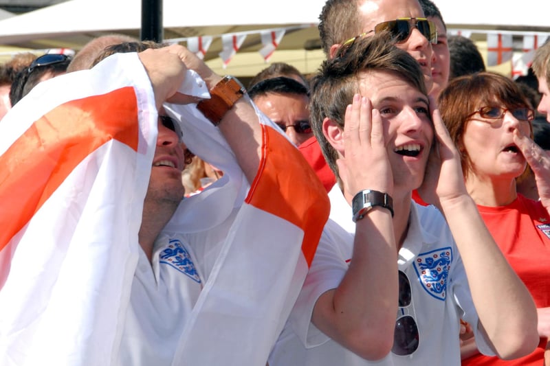 Fans watch the England v Slovenia game at The Swan in Mansfield.