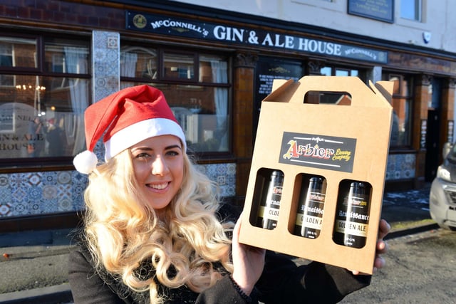 Christmas ale gift packs were on sale at McConnell's Gin and Ale pub in 2016 and here is bar manager Charli Wilkinson with one of them. Remember this?