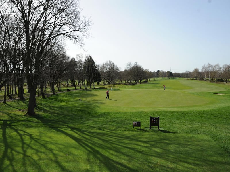 Two golfers get used to the greens at Doncaster GC.