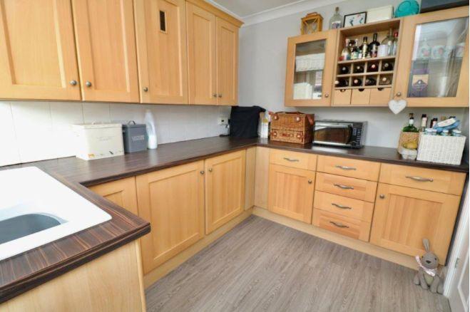 The kitchen has lovely fitted units for that all important storage space