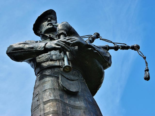 A piper at Bruar, Perthshire.