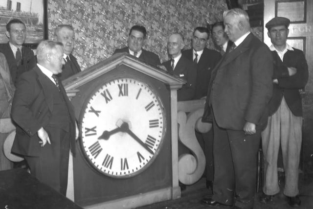 The presentation of Roker Park Clock Stand clock for Roker Avenue Social Services Centre is seen here in August 1936. Mr John Ruddick, Chief Constable, right, received the clock from the old stand at Roker Park Football Ground on behalf of the Unemployed Social Centre in Roker Avenue. 
The clock, which will replace the small existing one, was handed over by Mr John Cochrane, on behalf of the Club's directors.