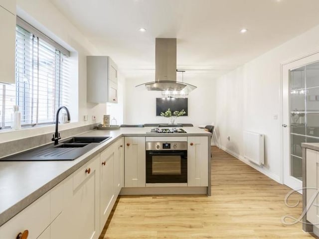 At the end of a lengthy entrance hallway, you will walk in to this modern kitchen/diner, which is an open-plan space sure to impress. It comes complete with a contemporary range of matching units and cabinets, with complementary work surface over, inset sink and drainer, and integrated oven with gas hob and stainless steel extractor fan.