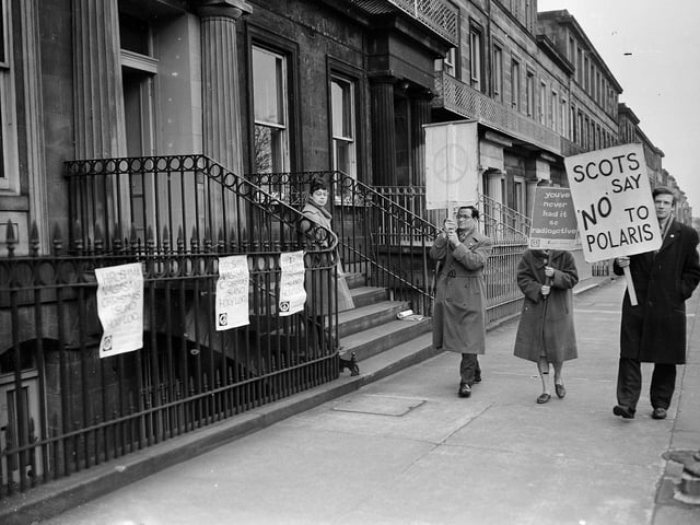 Demonstration by Edinburgh University Students outside US Consulate in Regent Terrace Edinburgh.  Placard reads  Scots say No to Polaris.