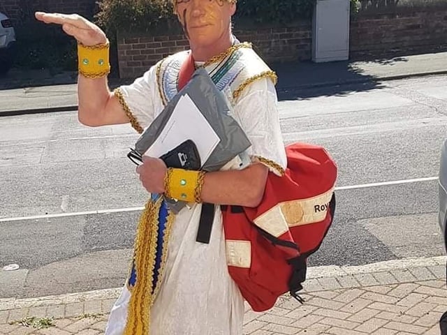 Postman David Evans on his rounds in Edlington