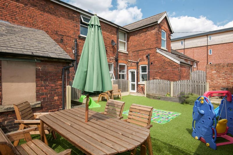The low maintenance private garden is excellent for both kids to play and adults to entertain in.