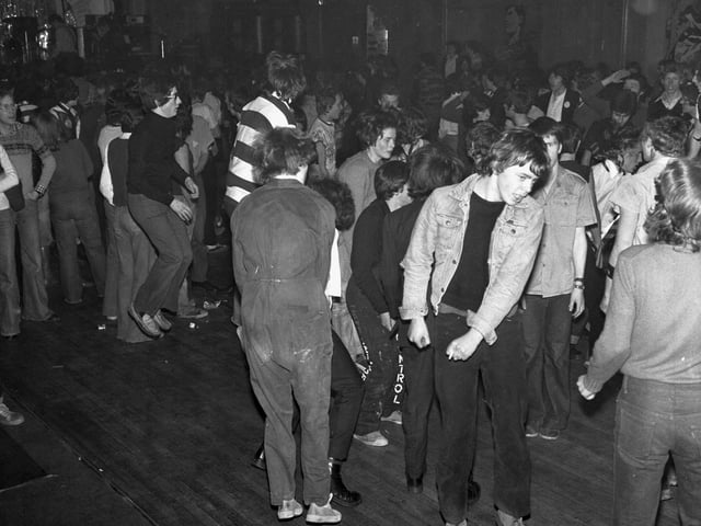 Early punks - fans of The Stranglers dancing at their concert Edinburgh in February 1978.