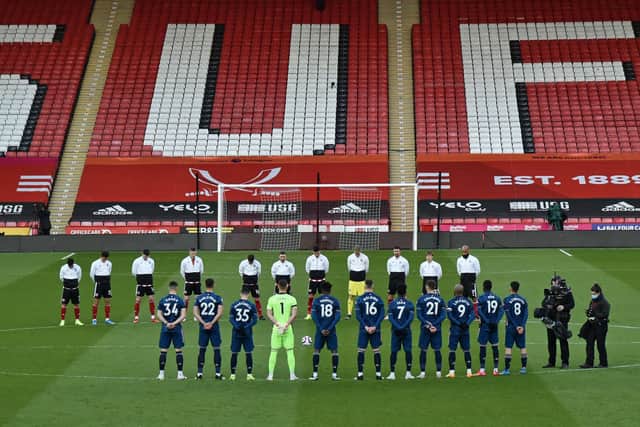 Sheffield United and Arsenal players pay their respects to Prince Philip (Photo by RUI VIEIRA/POOL/AFP via Getty Images)