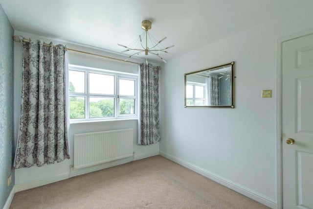 Bedroom 2 - An attractive double room with a rear facing double glazed window. There is a central heating radiator and a walk-in wardrobe.