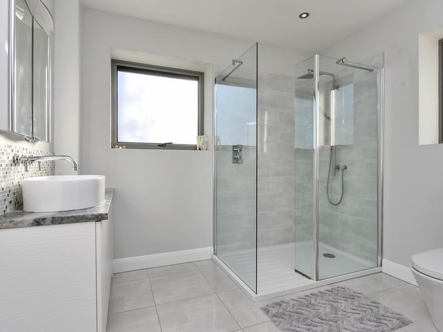 The house has five bathrooms and one WC.