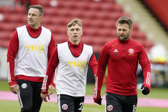 Oliver Norwood (right) has belief in his Sheffield United team mates: Andrew Yates / Sportimage