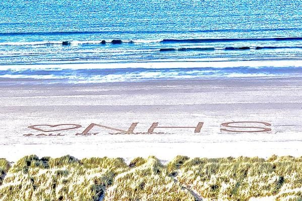 A giant sand art message of support to the NHS and key workers hwas drawn on Bamburgh beach by castle maintenance manager Andrew Heeley on his daily exercise while in lockdown.