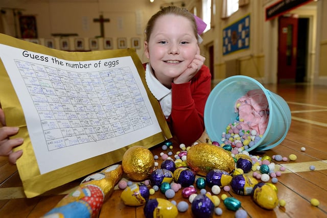 Sacred Heart Primary school pupil Layla Campbell putting eggs into the bucket for the  "Guess the number of eggs" event. Remember this from 2017?