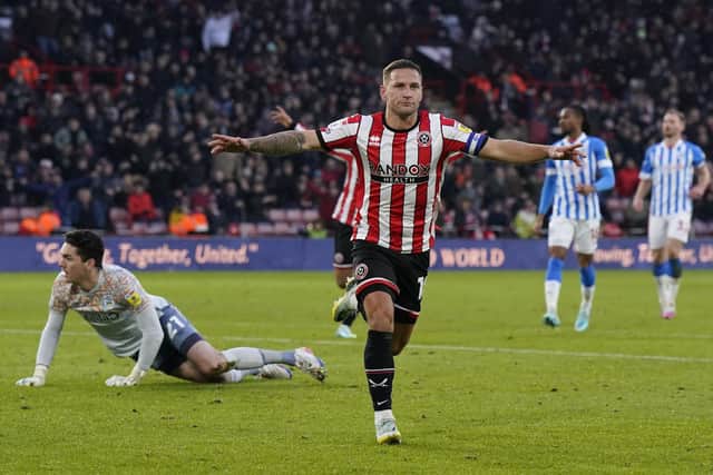 Billy Sharp of Sheffield United celebrates his goal against Huddersfield Town: Andrew Yates / Sportimage