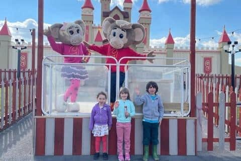 Anna, four, Thomas, seven, and Rebecca, six, celebrate being back at Gulliver's