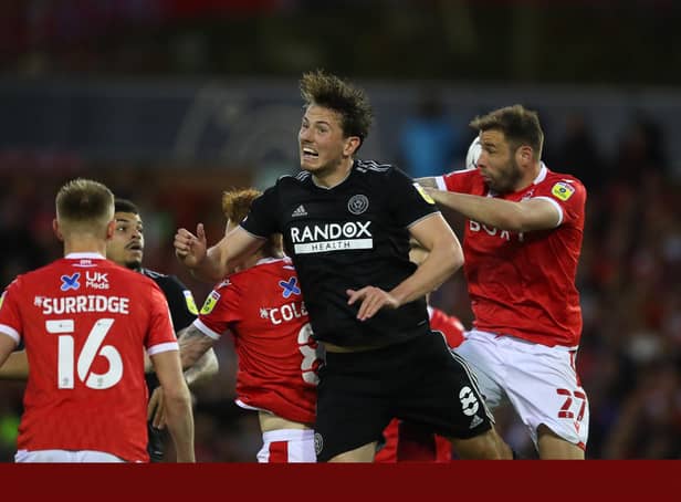 Steve Cook of Nottingham Forest with Sander Berge of Sheffield United during Tuesday's breathless match at the City Ground: Simon Bellis / Sportimage