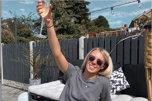 Leah Washington marked the fifth anniversary of the horror smash with a glass of champagne. (Photo: Instagram).