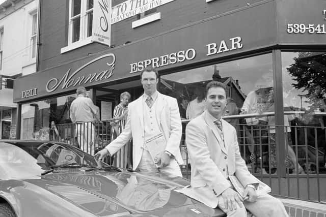Maurizio Mori (foreground, sitting on car) and Gian Bohen (behind the car) celebrate the launch of Nonnas in this rare photo.