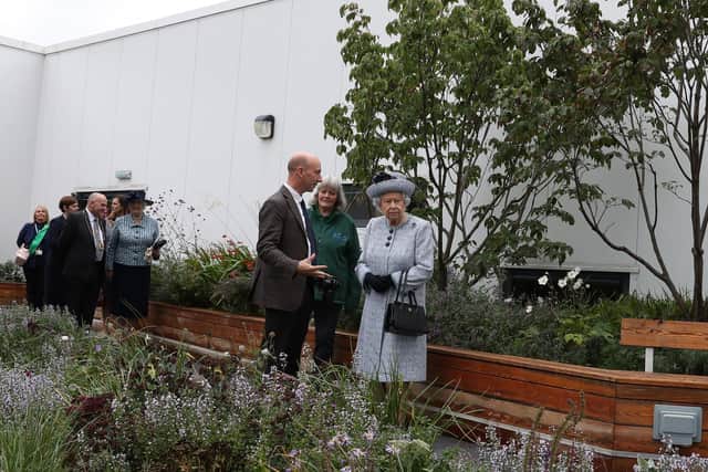 The Queen with Professor Nigel Dunnett, during a visit to Aberdeen Royal Infirmary where he adapted a garden so that wheelchairs and intensive care unit patients could make use of the area