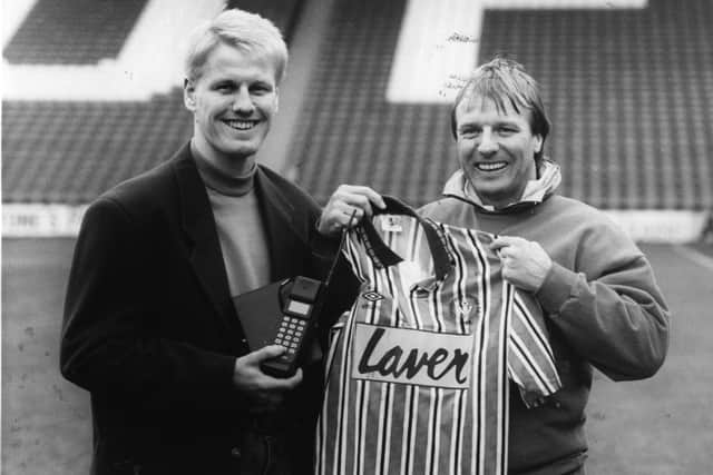 Dave Bassett with new signing Paul Rogers