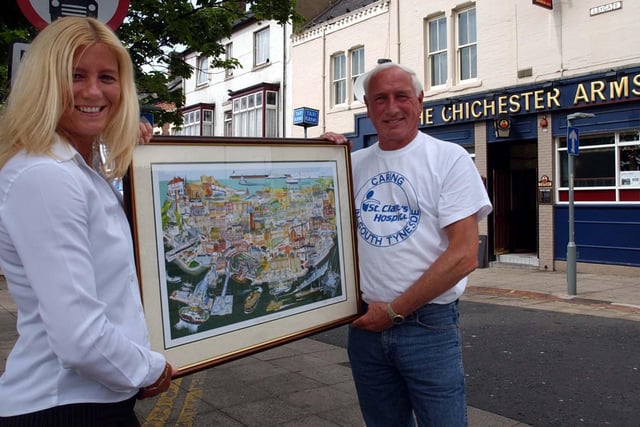 Artist Bob Olley with then manageress Judith Gardner in 2004 but who can tell us more about this photo?