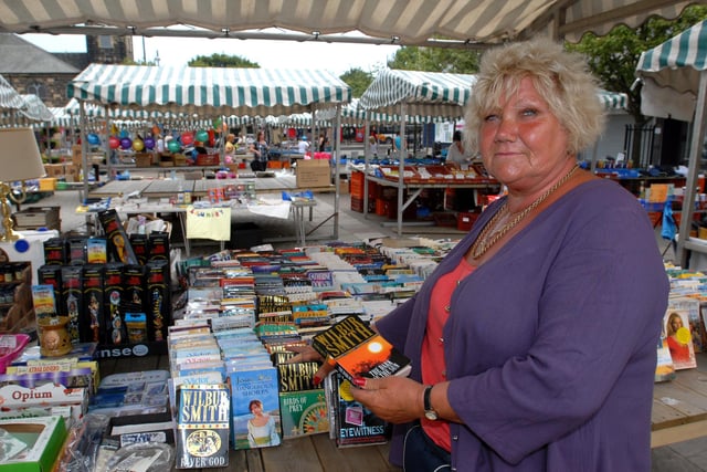 Stall holder Lynn Lucas had plenty of books on offer in this July 2011 photo.