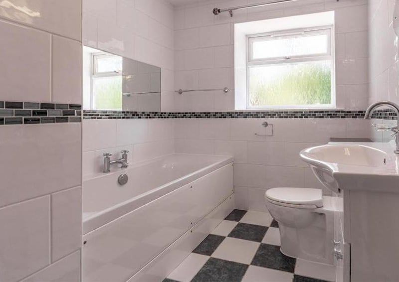 Make a splash in another of the property's en-suite bathrooms. Spotlessly clean.