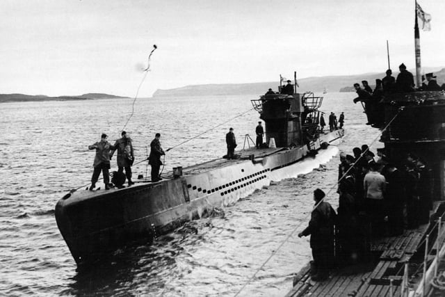 German U-Boat U236  (left) similar to U-Boat U564. U564 was photographed in action during the 1940's. The pictures were discovered in a attic and have been donated to the Royal Navy Submarine Museum Gosport.