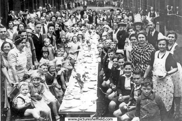 Derick Todd, seated fourth from the right at the VE Day party in Bradford Road, Attercliffe, Sheffield