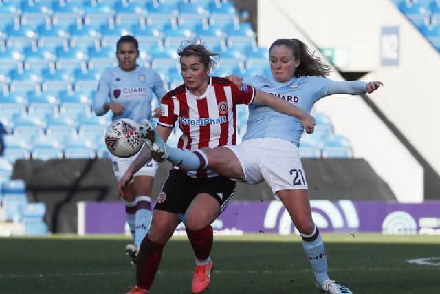 Maddy Cusack of Sheffield Utd battles for the ball. Photo: Simon Bellis/Sportimage