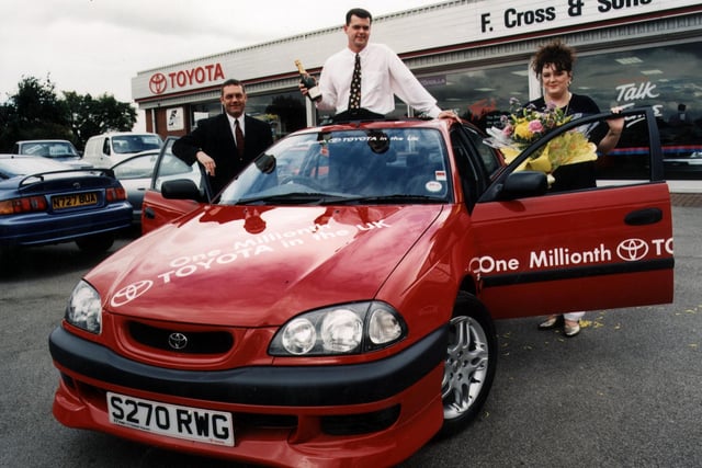 Toyota (GB) Ltd sells its one millionth passenger car in the UK. Pictured (right to left)  in 1998 were proud owners Tracey and John McAllister and Kevin Orridge, Sales Manager of supplying dealers, F.Cross & Sons, Doncaster, South Yorkshire.