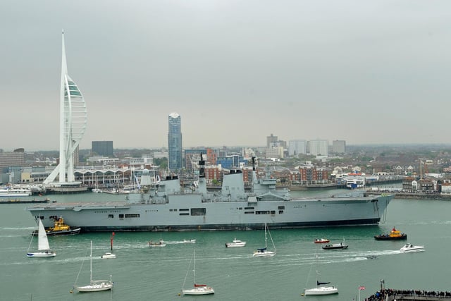 HMS Ark Royal leaves Portsmouth Harbour for its very last time - sadly under-tow! 20th May 2013. Picture: Malcolm Wells 131356-4833