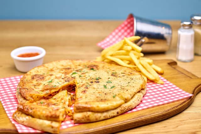 Lasagne-in-a-pizza is on the menu at the Hardy Pick and Sword Dancer pubs in Sheffield. Picture: Hungry Horse