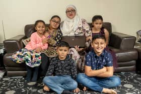 Salma Akhtar pictured with her children Haadiya, Dayyan, Yusra, Ruqayyah and Abdul-Hannan, were the first family to receive a laptop as part of the Laptops for Kids campaign. Picture: Scott Merrylees.