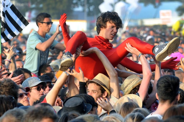 A fan is carried by the crowd as Pulp play at the Vieilles Charrues (Old ploughs) festival in France in 2011.