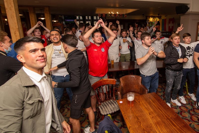 England fans at Green Post, Hilsea, Portsmouth for the England vs Italy match  on 11 July 2021. Pictured: Fans celebrate England's goal. Picture: Habibur Rahman