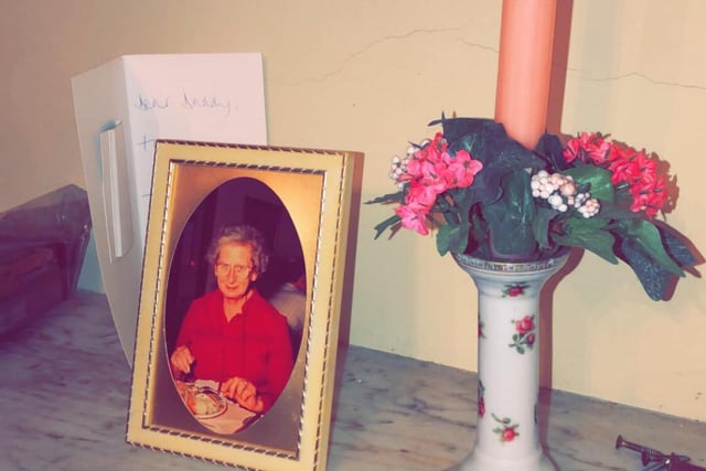 The portrait of an elderly lady still adorns one of the mantelpieces.
