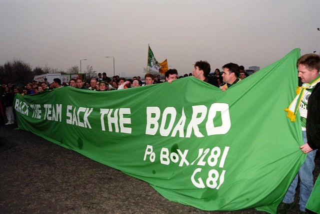 Fans unhappy at the way the club is being run by the board make their feelings known outside Celtic Park during the 1993/94 season