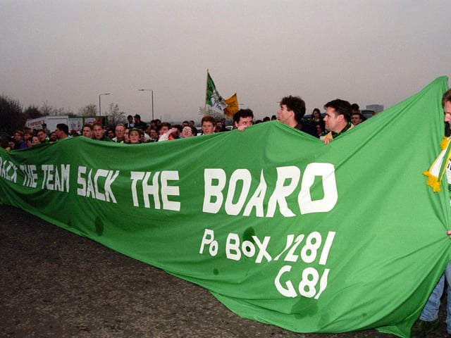 Fans unhappy at the way the club is being run by the board make their feelings known outside Celtic Park during the 1993/94 season