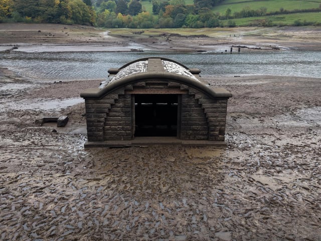 An aerial view of the of the pump house which provided water to the village Derwent Village, flooded in the 1940s to provide drinking water for the East Midlands and Sheffield, exposed due to the low water level at Ladybower Reservoir and drought conditions. (Photo by Christopher Furlong/Getty Images)