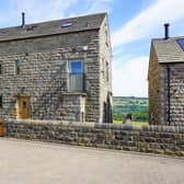 The stone-built house in Stocksbridge, Sheffield, has attractive wooden beams and oak flooring