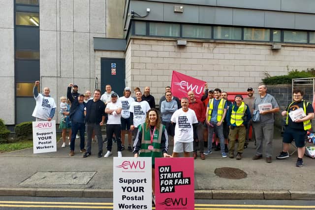 Postal workers on the picket line at the Sheffield City Delivery Office in Pond Street. Over 110,000 Royal Mail staff have walked out over a pay dispute.