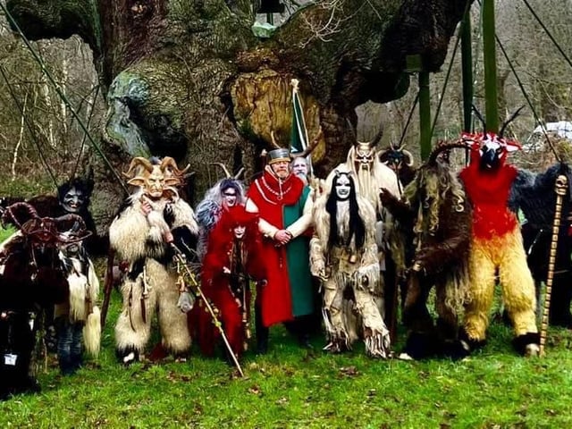 A terrifying collection of scary 'Krampus' creatures  (from the Whitby Krampus Run group) are seen gathering at the Major Oak in Sherwood Forest.  They are pictured with the Sheriff of Nottingham (Richard Townlsey) during the Spirits of the Forest and Wassailing weekend. The Krampus along with evil spirits of the forest, were sent on their way during a traditional 'wassailing' ceremony.
The Krampus is a central European legend, concerning a half-goat, half-demon creature that punishes naughty children at Christmastime whilst ‘wassailing’ is a Twelfth Night tradition, rooted in the pagan custom of visiting orchards to sing to the trees and spirits in the hope of ensuring a good harvest. 
A spiced mulled cider brew is traditionally drunk from a special wassailing.