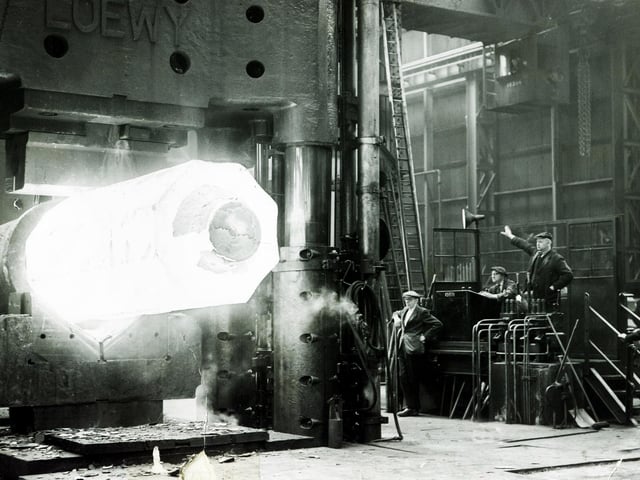 Steelmaking at Hadfields - A 35 ton ingot under the 2,700 ton press being forged at Hadfields' East Hecla Works, Sheffield, in 1955