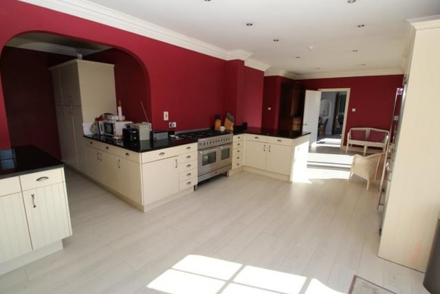 The kitchen/family room boasts a Brittania range cooker, Samsung American style fridge/freezer and integrated dishwasher. The family room side of this area looks out onto the gardens from windows with one way privacy glass