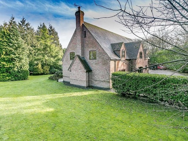 This shot gives you an idea of the fine garden that comes with the home. Excellently maintained.