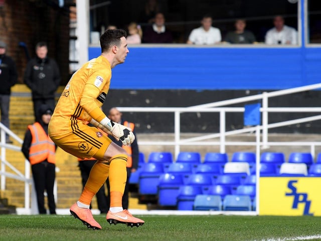 Came so close to saving Clarke-Harris’ penalty but just couldn’t get enough on it. Could do little about the first goal, a stunning finish. 5