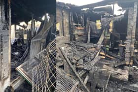The charred remains of pigeon lofts at Skye Edge Fields in Sheffield, where around 150 birds were killed in a fire on Friday, April 28. A previous fire at the same site in July 2022 killed an estimated 200 pigeons. There have been calls to clear up the site and do more to tackle fly-tipping and arson there. Photos: Neil Jenkinson