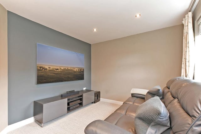 The versatile snug is an additional reception room that could be used as a home cinema.